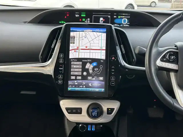 トヨタ プリウス ＰＨＶ A プレミアム 広島県 2018(平30)年 5.6万km ホワイトパールクリスタルシャイン ワンオーナー/衝突軽減ブレーキ/純正ナビ/地デジTV/・Bluetooth/純正USB・AUX端子/バックカメラ/シンプルインテリジェントパーキングアシスト【S-IPA】/レーンディパーチャーアラート/ヘッドアップディスプレイ【HUD】/ブラインドスポットモニター【BSM】/ステアリングヒーター/黒レザーシート/前席シートヒーター/運転席パワーシート/純正15インチアルミ/前後コーナーセンサー/LEDヘッドライト/ドライブレコーダー/オートマチックハイビーム/スマートキー/ETC2.0/充電ケーブル有り/保証書/取扱説明書/ナビ取扱説明書/純正フロアマット/スペアキー（スマートキー）