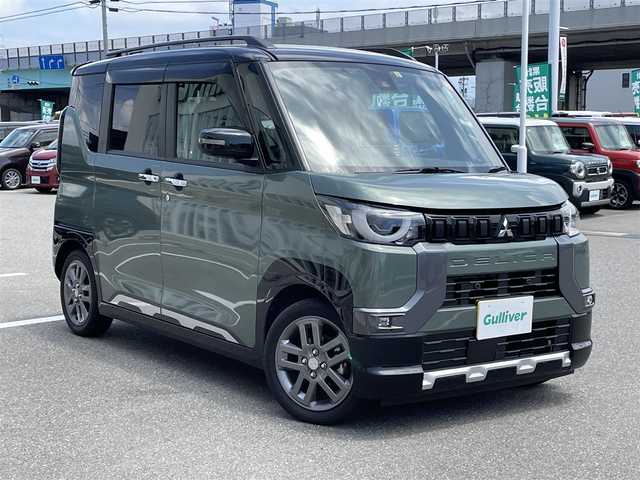 三菱 デリカミニ G プレミアム 石川県 2023(令5)年 1.6万km ＤグリーンＭ 純正9型ナビ/フルセグTV/アラウンドビューモニター/LEDヘッドライト/ETC/ドライブレコーダー/マイパイロット/スマートキー/プッシュスタート/シートヒーター/ハンドルヒーター/両側パワースライドドア/ABS/衝突軽減ブレーキ/純正アルミホイール/デジタルミラー/保証書