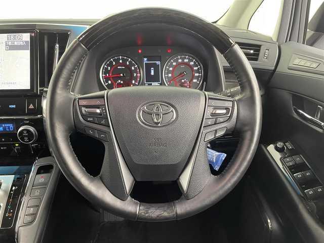 トヨタ アルファード S Cパッケージ 大分県 2018(平30)年 0.9万km ホワイトパールクリスタルシャイン 純正ナビ/フルセグ/DVD/Bluetooth/バックカメラ/純正フリップダウンモニター/純正デジタルインナミラー/両側パワスラ/ビルトインETC/三眼LEDライト/プリクラッシュ/前後コーナーセンサー/前席シートヒーター/前席ベンチレーション/前席パワーシート/純正フロアマット/スマートキーX2/保証書/取扱説明書