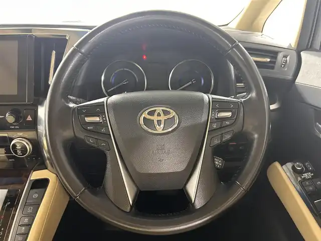 トヨタ アルファードハイブリット X 佐賀県 2022(令4)年 3.9万km ホワイトパールクリスタルシャイン 純正ナビ　/フリップダウンモニター　/ツインサンルーフ　/両側パワースライドドア　/衝突被害軽減装置　/クルーズコントロール　/ブラインドスポットモニター/レーンキープアシスト　/オットマン　/オートマチックハイビーム　/フルセグテレビ　/ＥＴＣ2.0