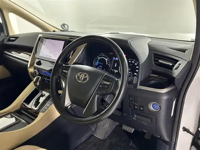 トヨタ アルファードハイブリット X 佐賀県 2022(令4)年 3.9万km ホワイトパールクリスタルシャイン 純正ナビ　/フリップダウンモニター　/ツインサンルーフ　/両側パワースライドドア　/衝突被害軽減装置　/クルーズコントロール　/ブラインドスポットモニター/レーンキープアシスト　/オットマン　/オートマチックハイビーム　/フルセグテレビ　/ＥＴＣ2.0