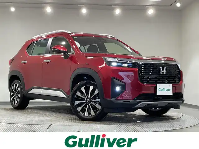 ホンダ ＷＲ－Ｖ Z+ 愛知県 2024(令6)年 1.1万km 赤 純正８インチナビ/衝突軽減ブレーキ/レーダークルーズコントロール/レーンキープアシスト/クリアランスソナー/先行車発進告知/バックカメラ/パドルシフト/ハーフレザー/ビルトインＥＴＣ/USB入力端子/アクセサリーソケット/LEDヘッドライト/ISOFIX/純正フロアマット/純正１７インチアルミホイール