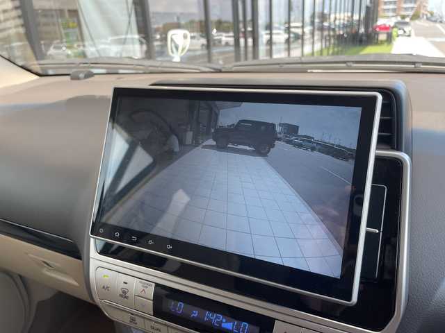トヨタ ランドクルーザー プラド TX 愛知県 2021(令3)年 2.2万km ホワイトパールクリスタルシャイン モデリスタエアロ/10型ナビ（フルセグTV）/Bluetooth/バックモニター/バックカメラ/ビルトインETC/ルーフレール/トヨタセーフティセンス/レーダークルーズコントロール/クリアランスソナー/LEDヘッドライト/オートライト/オートハイビーム/純正17インチAW/ドアバイザー/フロアマット/シートカバー/プッシュスタート/スマートキー