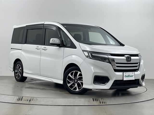 ホンダ ステップワゴン スパーダ ホンダセンシング 埼玉県 2019(令1)年 6.3万km パール 純正ナビ（CD・DVD・AM・FM・フルセグ・Bluetooth・USB）/バックカメラ/前方ドライブレコーダー/ビルトインETC/両側パワースライドドア/アダプティブクルーズコントロール/プリクラッシュセーフティ/レーンディパーチャーアラート/先行車発進お知らせ機能/横滑り防止装置/標識認識機能/レーンキープアシスト/盗難防止装置/オートライト/パドルシフト/ステアリングリモコン/アイドリングストップ/純正フロアマット/ウィンカーミラー/フロントフォグランプ/ロールサンシェード/プッシュスタート