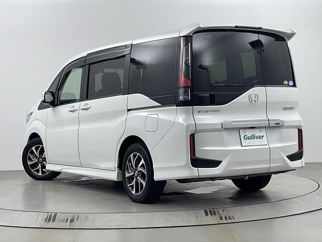 ホンダ ステップワゴン スパーダ ホンダセンシング 埼玉県 2019(令1)年 6.3万km パール 純正ナビ（CD・DVD・AM・FM・フルセグ・Bluetooth・USB）/バックカメラ/前方ドライブレコーダー/ビルトインETC/両側パワースライドドア/アダプティブクルーズコントロール/プリクラッシュセーフティ/レーンディパーチャーアラート/先行車発進お知らせ機能/横滑り防止装置/標識認識機能/レーンキープアシスト/盗難防止装置/オートライト/パドルシフト/ステアリングリモコン/アイドリングストップ/純正フロアマット/ウィンカーミラー/フロントフォグランプ/ロールサンシェード/プッシュスタート