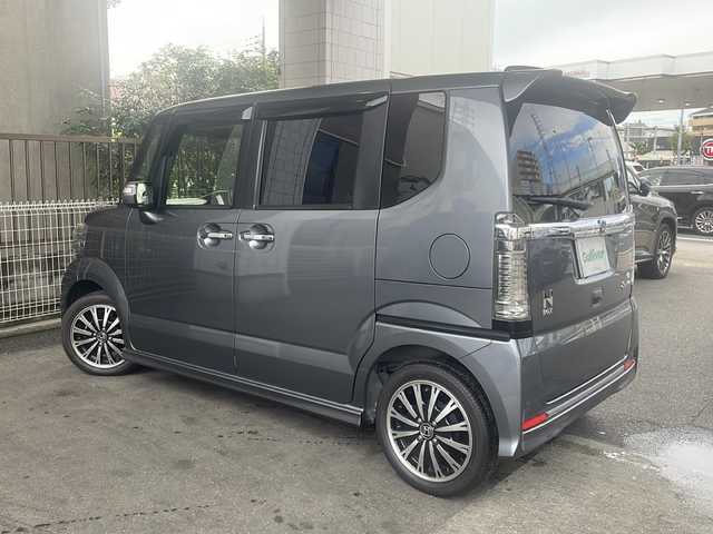 ホンダ Ｎ ＢＯＸ カスタム G ターボSSパッケージ 京都府 2017(平29)年 5.7万km シャイニンググレーM 社外SDナビ/（フルセグTV・CD・DVD・BT）/クルーズコントロール/横滑り防止システム/パドルシフト/黒レザーシート/前席シートヒーター/純正15インチAW/ETC/スペアキー有