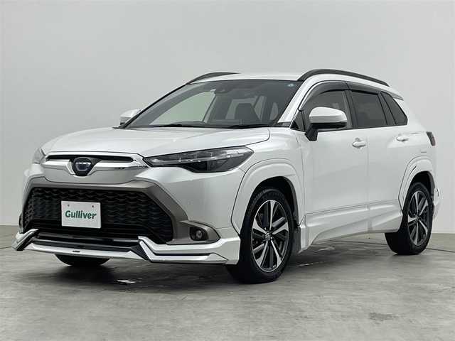 トヨタ カローラ クロス ハイブリッド Z 群馬県 2022(令4)年 1.9万km プラチナホワイトパールマイカ モデリスタ　純正ディスプレイオーディオ　パノラミックビューモニター　パワーバックドア　ＢＳＭ　レーダークルーズコントロール　ＬＥＤライト　ＡＨＢ　シートヒーター　純正１８インチＡＷ　ＥＴＣ２．０　禁煙