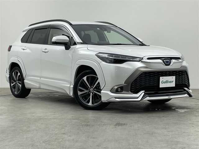 トヨタ カローラ クロス ハイブリッド Z 群馬県 2022(令4)年 1.9万km プラチナホワイトパールマイカ モデリスタ　純正ディスプレイオーディオ　パノラミックビューモニター　パワーバックドア　ＢＳＭ　レーダークルーズコントロール　ＬＥＤライト　ＡＨＢ　シートヒーター　純正１８インチＡＷ　ＥＴＣ２．０　禁煙