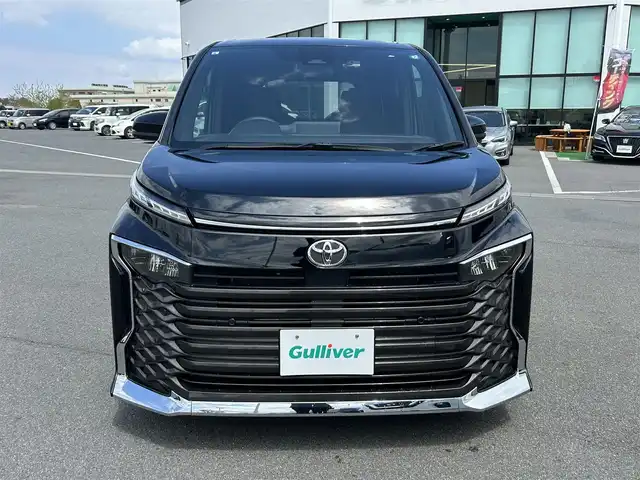 トヨタ ヴォクシー S－G 奈良県 2024(令6)年 1.1万km アティチュードブラックマイカ 純正8インチディスプレイオーディオ/（AM/FM/BT/USB)/バックカメラ/両側パワースライドドア/トヨタセーフティセンス/ETC2.0/ドライブレコーダー/純正LEDヘッドライト/純正フロアマット/電格ウインカーミラー/プッシュスタート