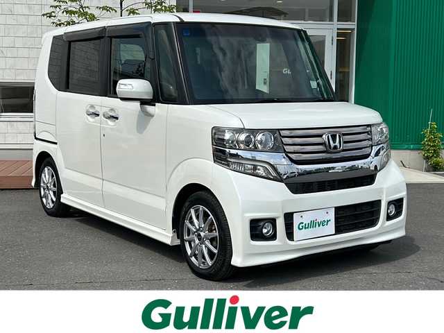ホンダ Ｎ ＢＯＸ 青森県 2015(平27)年 9.7万km プレミアムホワイトパール 4WD/社外SDナビ/フルセグTV/CD/BT/DVD/iPod/バックカメラ/Aパッケージ/あんしんパッケージ/サイドカーテンエアバッグ/シティブレーキサポート/両側パワースライドドア/チップアップシート/前席シートヒーター/ETC/オートライト/HIDヘッドライト/フォグライト/アイドリングストップ/パワーステアリング/パワーウィンドウ/社外14インチアルミホイール