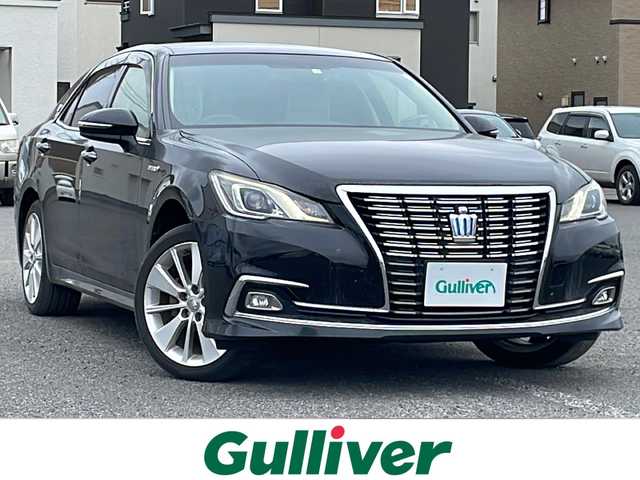 トヨタ クラウン ハイブリッド ロイヤルサルーン Four 道央・札幌 2016(平28)年 19.6万km ブラック ４WD/寒冷地仕様/純正メーカーナビ/CD/DVD/BD/BT/フルセグ/横滑り防止装置/クルーズコントロール/バックカメラ/ビルトインETC/ドライブレコーダー/EVMODE/ワイパーデアイサー/前席パワーシート/前席シートヒーター/革巻きステアリング/ステアリングリモコン/ハンドルヒーター/自動防眩ミラー/MTモード付AT/プッシュスタート/スマートキー/LEDヘッドライト/オートライト/フォグランプ/電動格納ミラー/ヒーテッドドアミラー/ウィンカーミラー/純正フロアマット/ドアバイザー
