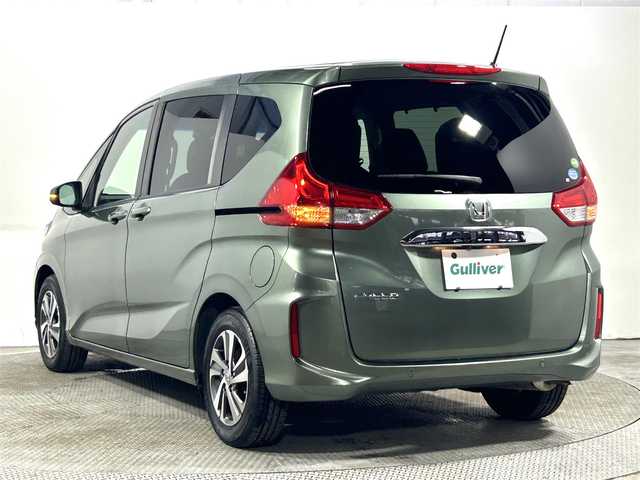 ホンダ フリード G ホンダセンシング 大阪府 2020(令2)年 1.9万km シルバーミストグリーンM 純正ナビ（フルセグＴＶ／ＤＶＤ／ＣＤ／Ｂｌｕｅｔｏｏｔｈ）　両側電動ドア　衝突軽減　レーンアシスト　レーダークルコン　ＥＴＣ　ドラレコ　プッシュスタート　スマートキー　純正アルミ　オートエアコン
