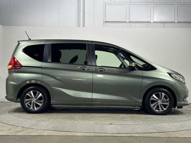 ホンダ フリード G ホンダセンシング 大阪府 2020(令2)年 1.9万km シルバーミストグリーンM 純正ナビ（フルセグＴＶ／ＤＶＤ／ＣＤ／Ｂｌｕｅｔｏｏｔｈ）　両側電動ドア　衝突軽減　レーンアシスト　レーダークルコン　ＥＴＣ　ドラレコ　プッシュスタート　スマートキー　純正アルミ　オートエアコン