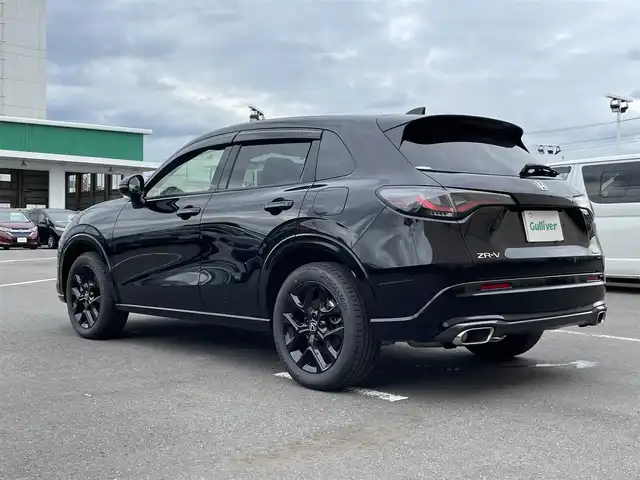 ホンダ ＺＲ－Ｖ ハイブリッド e:HEV Z ブラックスタイル 東京都 2024(令6)年 2.5万km クリスタルブラックパール ４ＷＤ　/純正９型ナビ　/電動リアゲート　/追従クルコン　/ビルトイン２．０ＥＴＣ　/前後ドラレコ　/フルセグＴＶ　/置型充電　/パドルシフト　/パワーシート　/シートメモリー　/シートヒーター　/ＢＳＭ　/コーナーセンサー