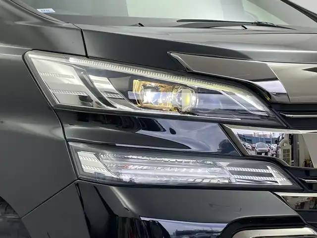 トヨタ ヴェルファイア Z Aエディション ゴールデンアイズ 新潟県 2016(平28)年 9.6万km ブラック 純正メモリナビ【NSZT-Y66T】/　フルセグTV/Bluetooth/CD/DVD/トヨタセーフティセンス/・プリクラッシュセーフティ/・レーントレーシングアシスト/・レーダークルーズコントロール/・アダプティブハイビームシステム/・ロードサインアシスト/前後コーナーセンサー/フリップダウンモニター/パワーバックドア/両側パワースライドドア/ハーフレザーシート/バックモニター/ビルトインETC2.0/LEDヘッドライト/横滑り防止装置