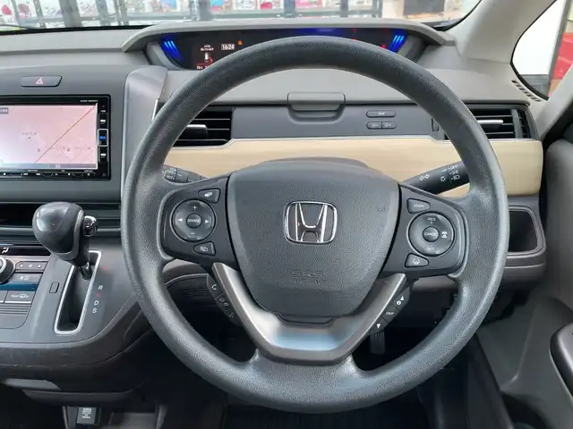 ホンダ フリード G ホンダセンシング 千葉県 2018(平30)年 1.2万km コバルトブルーパール 純正SDナビ/(Bluetooth/DVD/CD/AM/FM)/バックカメラ/衝突被害軽減システム/車線逸脱警報/クルーズコントロール/両側パワースライドドア/横滑り防止装置/ETC/ドライブレコーダー/アイドリングストップ/オートライト/ウィンカーミラー/電動格納ミラー/シートリフター/プッシュスタート/スマートキー/フロアマット/ドアバイザー/スペアキー/取扱説明書