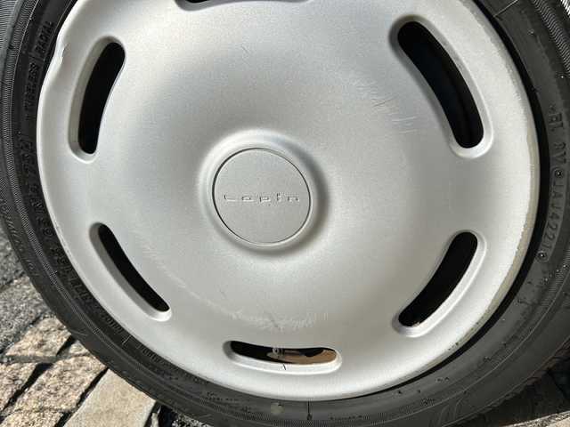 スズキ ラパン 静岡県 2013(平25)年 9万km マルーンブラウンパール ・社外ナビ（AVN112M）/・ワンセグTV（AM.FM.CD.USB）/・プッシュスタート/・ドアバイザー/・純正ホイールキャップ/・パワーウィンドウ/・社外フロアマット