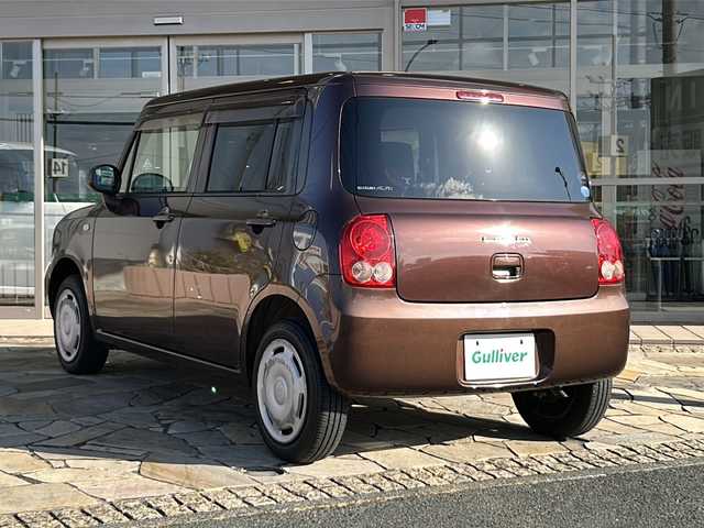 スズキ ラパン 静岡県 2013(平25)年 9万km マルーンブラウンパール ・社外ナビ（AVN112M）/・ワンセグTV（AM.FM.CD.USB）/・プッシュスタート/・ドアバイザー/・純正ホイールキャップ/・パワーウィンドウ/・社外フロアマット