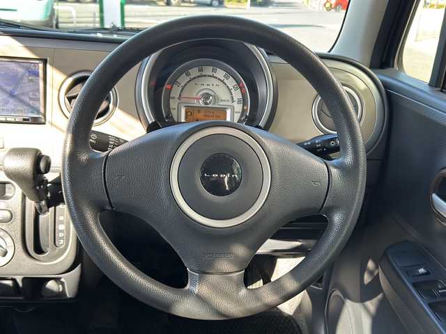 スズキ ラパン 静岡県 2013(平25)年 9万km マルーンブラウンパール ・社外ナビ（AVN112M）/・ワンセグTV（AM.FM.CD.USB）/・プッシュスタート/・ドアバイザー/・純正ホイールキャップ/・パワーウィンドウ/・社外フロアマット