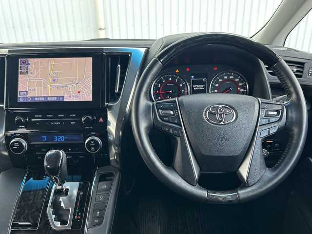 トヨタ ヴェルファイア Z Gエディション 愛媛県 2020(令2)年 3.2万km ブラック 純正ナビ/Bluetooth/フルセグ/SD/バックカメラ/クルーズコントロール追従有り/純正ドライブレコーダー前のみ/両側パワースライドドア/純正18インチAW/ETC/ベンチレーション/エアシート/シートヒーター/パワーバックドア/パワーシート/シートメモリー/サンルーフ/純正フロアマット/コーナーセンサー/フォグランプ/レーンキープアシスト/オートLEDヘッドライト/保証書/取扱説明書