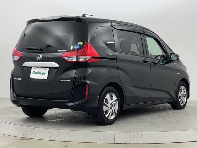 ホンダ フリード ハイブリット G ホンダセンシング 新潟県 2017(平29)年 4.7万km クリスタルブラックパール ホンダセンシング/レーダークルーズコントロール/レーンキープアシスト/先行車発信お知らせ機能/ロードサインアシスト/純正ナビ/フルセグTV/CD/DVD/Bluetooth/ラジオ/両側パワースライドドア/バックカメラ/LEDヘッドライト/オートライト/ステアリングリモコン/スマートキー/ビルトインETC/前後ドライブレコーダー