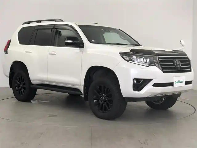 トヨタ ランドクルーザー プラド TX-L 70thアニバーサリーLTD 愛知県 2022(令4)年 4.1万km ホワイトパールクリスタルシャイン サンルーフ/茶革シート　　/純正9インチSDナビ　/(フルセグＴＶ/DVD/CD/SD)/バックカメラ　/ジャオスリフトアップ　/純正サスペンション積込　/社外グリル装着　/70th専用フロアマット/シートヒーターD＋N席/エアシートD＋N席/パワーシートD＋N席/ターボ/ETC/トヨタセーフティセンス/・LDA/・クリアランスソナー/・PCS/・RSA/・先行車発進告知/アダクティブクルーズコントロール/2ndSTART/ドアバイザー