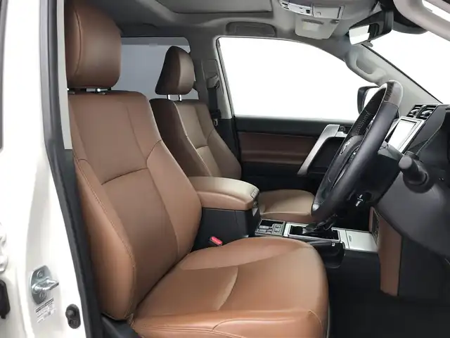 トヨタ ランドクルーザー プラド TX-L 70thアニバーサリーLTD 愛知県 2022(令4)年 4.1万km ホワイトパールクリスタルシャイン サンルーフ/茶革シート　　/純正9インチSDナビ　/(フルセグＴＶ/DVD/CD/SD)/バックカメラ　/ジャオスリフトアップ　/純正サスペンション積込　/社外グリル装着　/70th専用フロアマット/シートヒーターD＋N席/エアシートD＋N席/パワーシートD＋N席/ターボ/ETC/トヨタセーフティセンス/・LDA/・クリアランスソナー/・PCS/・RSA/・先行車発進告知/アダクティブクルーズコントロール/2ndSTART/ドアバイザー