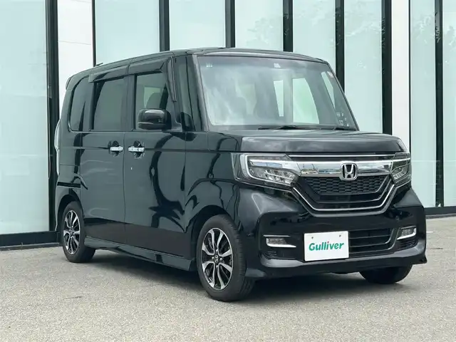 ホンダ Ｎ ＢＯＸ カスタム G L ホンダセンシング 大阪府 2020(令2)年 1.8万km クリスタルブラックパール 社外ナビ　/フルセグＴＶ/クルーズコントロール　/純正フロアマット　/アイドリングストップ/バックモニター/ビルトインETC/シートヒーター/片側パワースライドドア/LEDヘッドライト/純正14インチAW