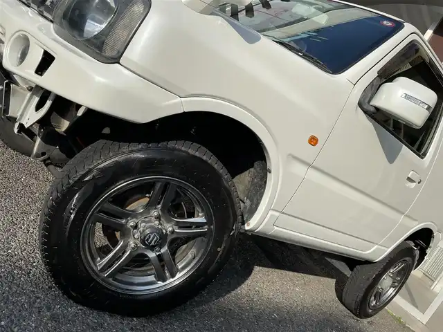 スズキ ジムニー クロスアドベンチャー XC 福島県 2012(平24)年 1.8万km パールホワイト 切替4WD/1.5インチリフトアップ/オーディオデッキ/（Bluetooth／ラジオ／SD）/Xadventure専用革シート/革巻きハンドル/フロアマット/サイドバイザー/テールランプカバー