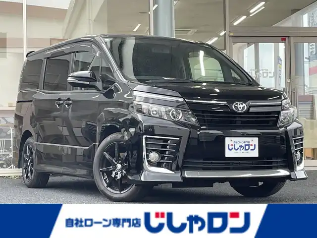 トヨタ ヴォクシー ZS 岐阜県 2014(平26)年 11.7万km ブラック (株)IDOMが運営する【じしゃロン多治見店】の自社ローン専用車両になります。こちらは現金またはオートローンご利用時の価格です。自社ローンご希望の方は別途その旨お申付け下さい。/ALPINEナビ/　（フルセグ/DVD/Bluetooth/HDMI）/バックカメラ/両側パワースライドドア/フリップダウンモニター/ETC/オートライト/LEDヘッドライト/フォグランプ/前後コーナーセンサー/ステアリングリモコン/17インチアルミ/シートカバー/横滑り防止装置