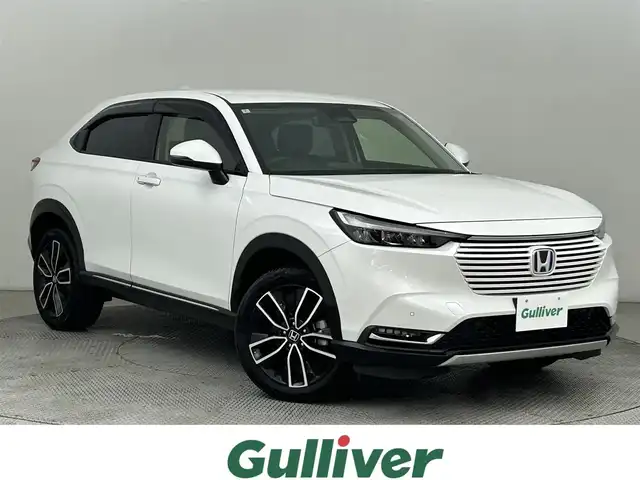 ホンダ ヴェゼル ハイブリッド e:HEV Z 道央・札幌 2024(令6)年 1.8万km プラチナホワイトパール ・４WD/・ホンダセンシング/・ホンダコネクトナビ/・バックカメラ/・ビルトインETC2.0/・ワイヤレス充電/・衝突軽減ブレーキ/・レーダークルーズコントロール/・レーンキープアシスト/・オートハイビーム/・踏み間違い防止/・BSM/・ハーフレザーシート/・前席シートヒーター/・ステアリングヒーター/・ステアリングスイッチ/・LEDヘッドライト/・フォグライト/・オートライト/・プッシュスタート/・スマートキーアイドリングストップ