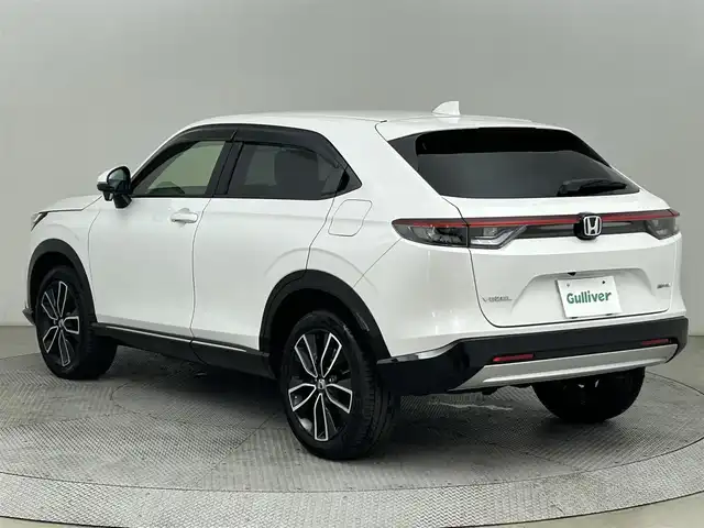 ホンダ ヴェゼル ハイブリッド e:HEV Z 道央・札幌 2024(令6)年 1.8万km プラチナホワイトパール ・４WD/・ホンダセンシング/・ホンダコネクトナビ/・バックカメラ/・ビルトインETC2.0/・ワイヤレス充電/・衝突軽減ブレーキ/・レーダークルーズコントロール/・レーンキープアシスト/・オートハイビーム/・踏み間違い防止/・BSM/・ハーフレザーシート/・前席シートヒーター/・ステアリングヒーター/・ステアリングスイッチ/・LEDヘッドライト/・フォグライト/・オートライト/・プッシュスタート/・スマートキーアイドリングストップ