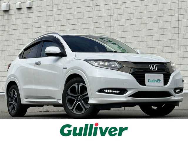 ホンダ ヴェゼル ハイブリッド Z ホンダセンシング 山形県 2016(平28)年 4万km ホワイトオーキッドパール ４WD/純正8インチナビ/フルセグTV/FM/AM/DVD/Bluetooth/衝突軽減ブレーキ/車線逸脱警報/横ブレ防止装置/バックカメラ/クルーズコントロール/プッシュスタート/ドライブレコーダー/純正マット/純正バイザー/ダブルエアバック/LEDライト/ＡＵＴＯライト/フォグランプ/保証書/取扱説明書