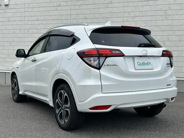 ホンダ ヴェゼル ハイブリッド Z ホンダセンシング 山形県 2016(平28)年 4万km ホワイトオーキッドパール ４WD/純正8インチナビ/フルセグTV/FM/AM/DVD/Bluetooth/衝突軽減ブレーキ/車線逸脱警報/横ブレ防止装置/バックカメラ/クルーズコントロール/プッシュスタート/ドライブレコーダー/純正マット/純正バイザー/ダブルエアバック/LEDライト/ＡＵＴＯライト/フォグランプ/保証書/取扱説明書