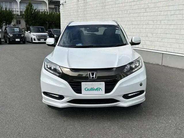 ホンダ ヴェゼル ハイブリッド Z ホンダセンシング 山形県 2016(平28)年 4万km ホワイトオーキッドパール ４WD/純正8インチナビ/フルセグTV/FM/AM/DVD/Bluetooth/衝突軽減ブレーキ/車線逸脱警報/横ブレ防止装置/バックカメラ/クルーズコントロール/プッシュスタート/ドライブレコーダー/純正マット/純正バイザー/ダブルエアバック/LEDライト/ＡＵＴＯライト/フォグランプ/保証書/取扱説明書