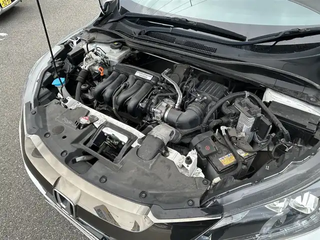 ホンダ ヴェゼル ハイブリッド Z ホンダセンシング 山形県 2016(平28)年 4万km ホワイトオーキッドパール ４WD/純正8インチナビ/フルセグTV/FM/AM/DVD/Bluetooth/衝突軽減ブレーキ/車線逸脱警報/横ブレ防止装置/バックカメラ/クルーズコントロール/プッシュスタート/ドライブレコーダー/純正マット/純正バイザー/ダブルエアバック/LEDライト/ＡＵＴＯライト/フォグランプ/保証書/取扱説明書