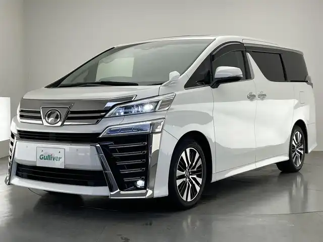 トヨタ ヴェルファイア Z Gエディション 愛知県 2018(平30)年 7万km ホワイトパールクリスタルシャイン 純正１０型ナビ　ツインムーンルーフ　純正１２．１型後席モニター　デジイン　３眼ＬＥＤオートライト　黒革　ＨＤＭＩ　追従クルコン　フルセグTV　ＤＶＤ　セーフティセンス　ＥＴＣ２．０　シートヒーター　シートベンチレーション　バックカメラ　禁煙車　メモリーシート　電子パーキング　USB　スマートキー　プッシュスタート