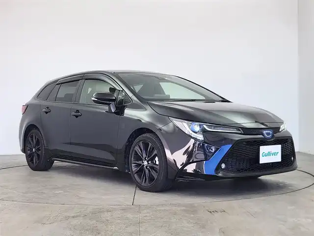 トヨタ カローラツーリング ハイブリッド ダブルバイビー 愛知県 2022(令4)年 2.2万km ブラックマイカ 純正9インチディスプレオーディオ/・フルセグテレビ/・Bluetooth接続/・AM/FMラジオ/・USB入力端子/・交通情報/・Miracast/シートヒーター/ステアリングヒーター/バックカメラ/スマートキー/プッシュスタート/ETC2.0/Toyota Safty Sense/・プリクラッシュセーフティ/・レーントレーシングアシスト/・レーダークルーズコントロール(全車速追従機能付)/・オートマチックハイビーム/・ロードサインアシスト/インテリジェントクリアランスソナー/車両接近通報装置/先行車発進告知機能/純正17インチアルミホイール