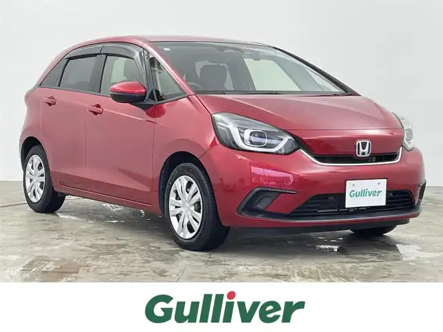 ホンダ フィット e:HEVホーム 千葉県 2020(令2)年 4万km プレミアムクリスタルレッドM 禁煙車/ホンダセンシング/・路外逸脱抑制機能/・踏み間違い衝突軽減システム/・衝突軽減ブレーキ/・コーナーセンサー/純正9インチメモリナビ/・型番：VXU-205FTi/・CD/DVD/Bluetooth/USB/フルセグTV/・バックカメラ/・ビルトインETC/革巻きステアリング/・ステアリングスイッチ/電子パーキング/・ブレーキホールド/純正フロアマット/純正ホイールキャップ/オートライト/・LEDヘッドライト/・ヘッドライトレベライザー