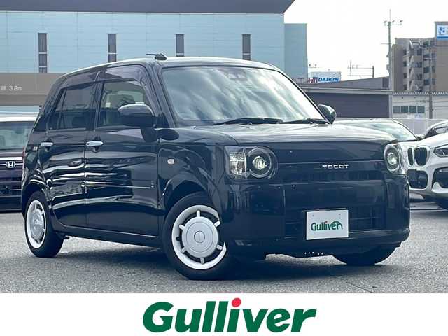 ダイハツ ミラ トコット G SA Ⅲ 福岡県 2023(令5)年 2.9万km ブラックマイカメタリック ワンオーナー/純正ナビNMZK-W730/(Bluetooth・フルセグTV・DVD・CD再生機能）/パノラマモニター（全周囲モニター）/ドライブレコーダー前方（DRN-HD2N)/シートヒーター（運転席・助手席）/USB入力端子（3か所）/アイドリングストップ（オフ）/純正フロアマット/先進発車お知らせ機能/スマートキー/スペアキー/パワーウィンドウ/パワーステアリング/保証書/取扱説明書