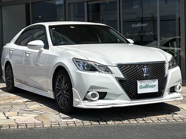 トヨタ クラウン アスリート S 静岡県 2013(平25)年 6.4万km ホワイトパールクリスタルシャイン 純正メーカーナビ/・AM/・FM/・DISC/・HDD/・USB/・Bluetooth/・フルセグＴＶ/主要装備/・バックカメラ/・リアスポイラー/・ＥＴＣ/・クルーズコントロール/・ＨＩＤヘッドライト/・オートライト/・フォグランプ/・横滑り防止装置/・サイドカーテンエアバッグ/・運転席＋助手席パワーシート/・ＭＴモード付ＡＴ/・１８インチ純正ＡＷ/・純正フロアマット/・パワーウィンドウ(全席オート)