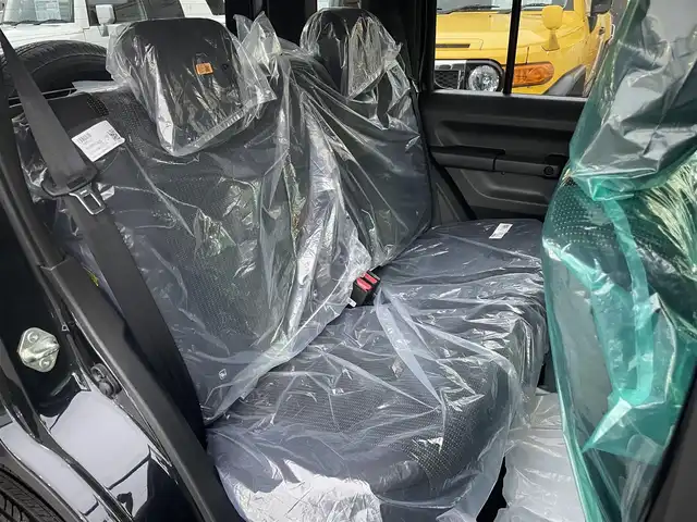 スズキ ジムニー ノマド FC 長野県 2025(令7)年 0.1千km 黒 切替４WDオートマ/ワンオーナー/前席シートヒーター/アイドリングストップ/オートマチックハイビーム/ダウンヒルアシストコントロール/横滑り防止/衝突被害軽減システム/ヘッドライトウォッシャー/クリアランスソナー/クルーズコントロール/純正アルミホイール/取扱説明書/保証書/スペアキー/プッシュスタート/スマートキー