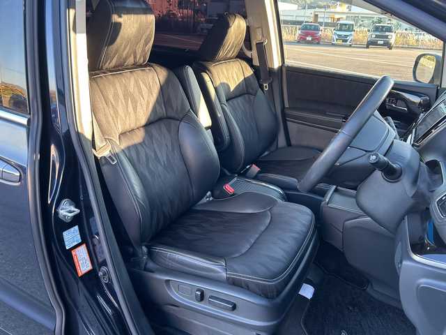 ホンダ オデッセイ ハイブリッド アブソルート・EXホンダセンジング 愛媛県 2018(平30)年 5.8万km プレミアムヴィーナスブラックP 全方位カメラ/純正ナビ/ブラインドスポットモニター/両側パワースライドドア/ビルトインETC2.0/衝突軽減システム/パワーシート/ハーフレザー/オートLED/シートヒーター/ドライブレコーダー前後/コーナーセンサー前後/クルーズコントロール追従あり/レーンキープアシスト/フォグランプ/純正フロアマット/３列シート/オットマン/スマートキー/スペアキー1本