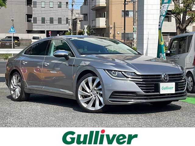 フォルクスワーゲン アルテオン TSI 4モーション エレガンス 東京都 2019(平31)年 2.3万km パイライトシルバーM ワンオーナー　新車時保証書/取扱説明書　ナビ説明書/プリクラッシュブレーキシステム【歩行者検知】/アダプティブクルーズコントロール/レーンチェンジアシスト/レーンキープアシスト/パーキングアシスト/アイドリングストップ/純正ナビ/フルセグTV/SD/CD/DVD/REC/BT/AUX/USB/360度カメラ　ETC【2.0】/レザーシート/全席シートヒーター/ハンドルヒーター/運転席メモリー付パワーシート【マッサージ付】/LEDヘッドライト/オートライト/スマートキー×2/パワートランク/パドルシフト付き革巻きハンドル/純正20インチアルミ