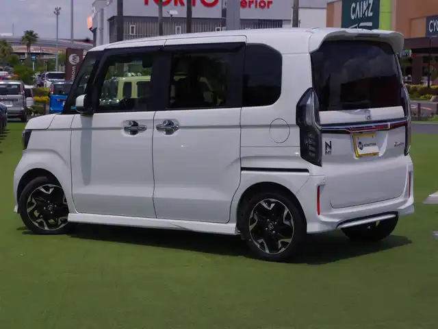 ホンダ Ｎ ＢＯＸ カスタム G EX ターボ ホンダセンシング 千葉県 2018(平30)年 2.2万km プラチナホワイトパール ホンダセンシング/・衝突軽減ブレーキ（CMBS）/・車線維持支援システム（LKAS）/・アダプティブクルーズコントロール（ACC）/・後方誤発進抑制機能/・誤発進抑制機能/両側パワースライドドア/純正SDナビ/地デジTV/【DVD/CD再生機能　Bluetooth接続】/バックカメラ/ドライブレコーダー/革巻きステアリング/ステアリングスイッチ/パドルシフト/前席シートヒーター/ETC/LEDヘッドライト/フォグライト/ウインカーミラー/リアコーナーセンサー/純正15インチアルミホイル/サイド/カーテンエアバッグ/スマートキー