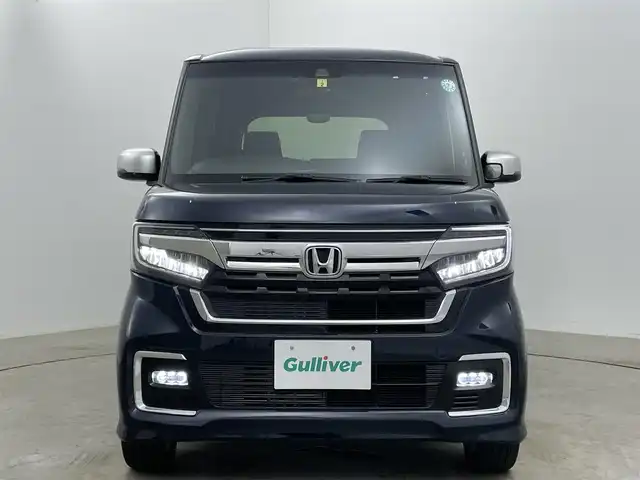 ホンダ Ｎ ＢＯＸ カスタム L ターボ 岡山県 2022(令4)年 2.2万km ミッドナイトブルービームM ホンダセンシング/Gathersナビゲーション/【フルセグ/Bluetooth/DVD】/純正17inアルミホイール+サマータイヤ：装着/レーダークルーズコントロール/ビルトインETC/シートバックテーブル/リアサンシェイド/LEDヘッドライト（AUTO機能付き）/シートヒーター/横滑り防止機能/衝突軽減システム/車線逸脱防止システム/スマートキー/プッシュスタート/コーナーセンサー/純正フロアマット