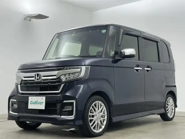 ホンダ Ｎ ＢＯＸ カスタム L ターボ 岡山県 2022(令4)年 2.2万km ミッドナイトブルービームM ホンダセンシング/Gathersナビゲーション/【フルセグ/Bluetooth/DVD】/純正17inアルミホイール+サマータイヤ：装着/レーダークルーズコントロール/ビルトインETC/シートバックテーブル/リアサンシェイド/LEDヘッドライト（AUTO機能付き）/シートヒーター/横滑り防止機能/衝突軽減システム/車線逸脱防止システム/スマートキー/プッシュスタート/コーナーセンサー/純正フロアマット
