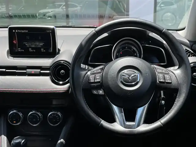 マツダ デミオ XD ツーリング 香川県 2015(平27)年 6.8万km 赤 登録時走行距離：67700km/CD/DVD再生/フルセグTV/Bluetooth/ヘッドアップディスプレイ/ステアリングリモコン/革巻きステアリング/クルーズコントロール/パドルシフト/ビルトインETC/LEDヘッドライト/フォグランプ/社外15インチAW【PREO】/レーンキープアシスト/横滑り防止装置/衝突被害軽減装置/プッシュスタート/スマートキー