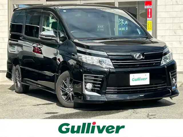 トヨタ ヴォクシー ZS 煌 岩手県 2015(平27)年 11.8万km ブラック モデリスタエアロ　/社外ＳＤナビ(型式NSCP-W64)/両側電動ドア　/フロントワイパーデアイサー　/ビルトインＥＴＣ　/スマートキー　/プッシュスタート　/革ステアリング　/オートライト　/バックカメラ　/フルセグＴＶ　/リアオートエアコン/保証書 取説