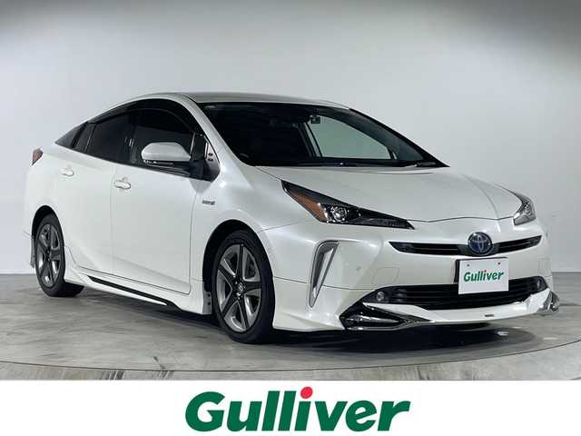 トヨタ プリウス A プレミアム　ツーリングセレ 福岡県 2018(平30)年 12.4万km ホワイトパールクリスタルシャイン モデリスタエアロ/JBLサウンド/純正11インチナビ/バックカメラ/プリクラッシュセーフティ/レーンディパーチャーアラート/オートハイビーム/アダプティブクルーズコントロール/クリアランスソナー/ブラインドスポットモニター/リアクロストラフィックアラート/ヘッドアップディスプレイ/パーキングアシスト/レザーシート/シートヒーター/エアシート/パワーシート/ドライブレコーダー/ETC/プッシュスタート/スマートキー/LEDヘッドライト/フォグライト/純正アルミホイール
